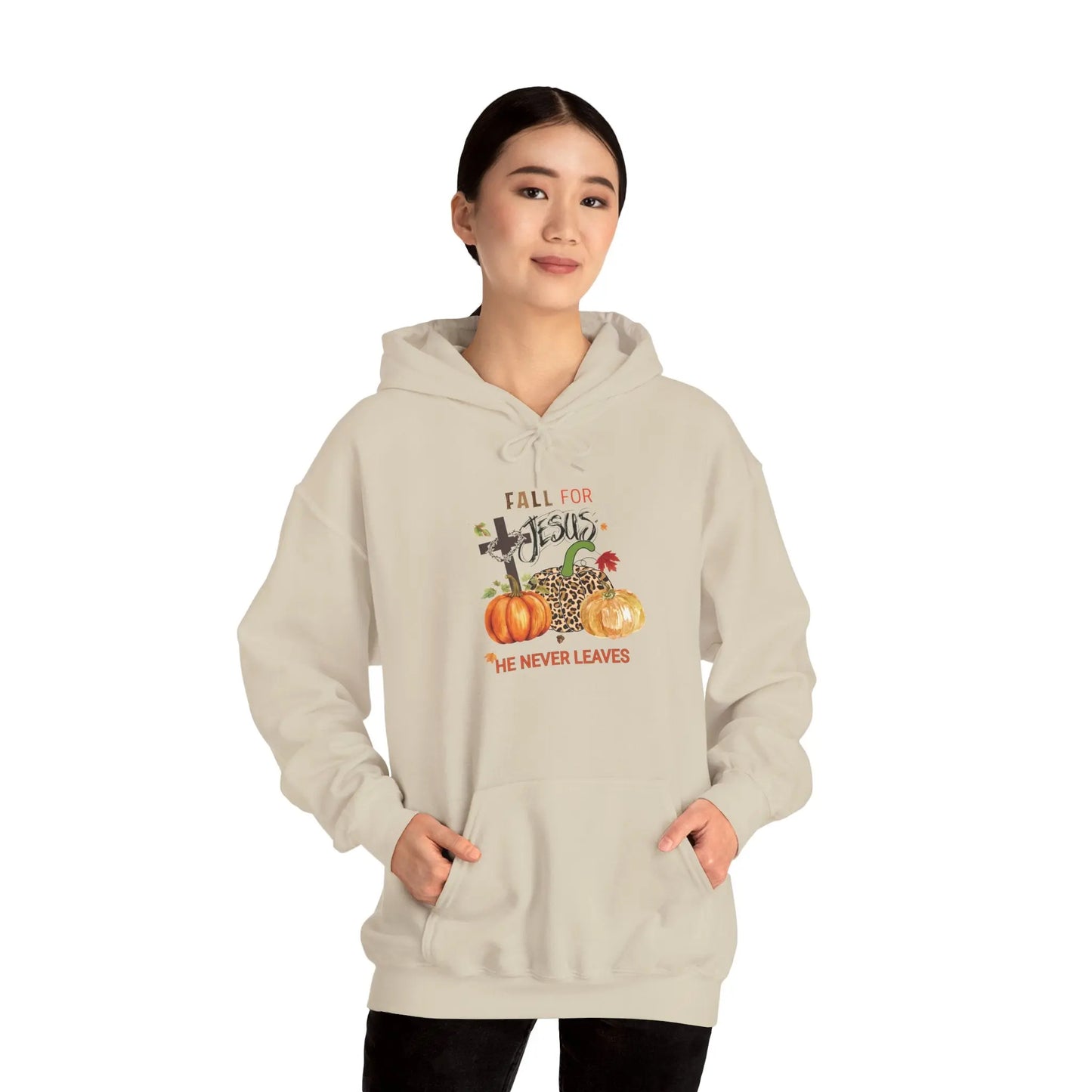 fall hoodie with “Fall for Jesus He Never Leaves” message, featuring pumpkins, leopard print, foliage, and cross design—faith-based autumn apparel. Makarios kustom printing